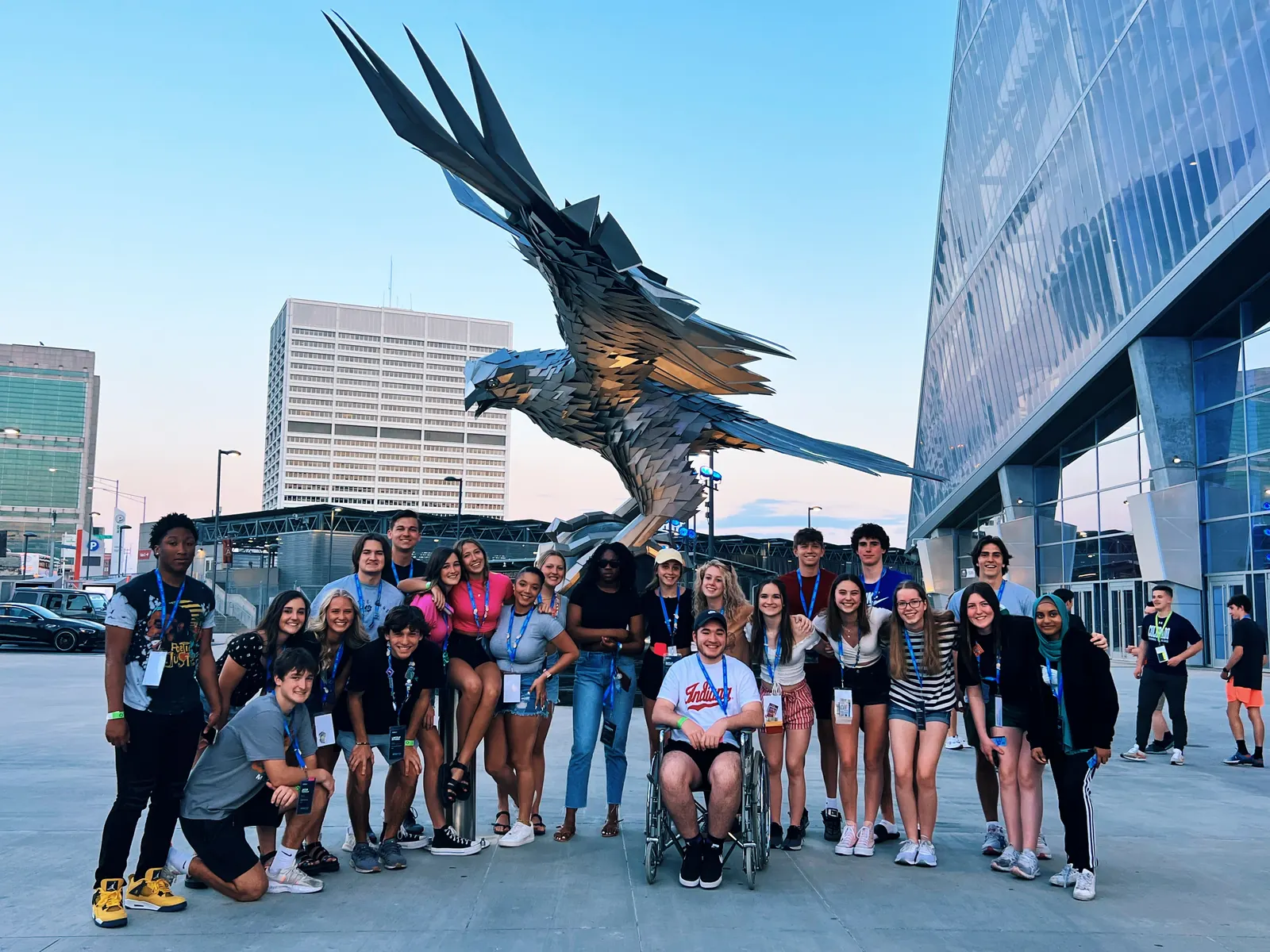 Brownsburg DECA members under the eagle sculpture outside the Indiana Convention Center
