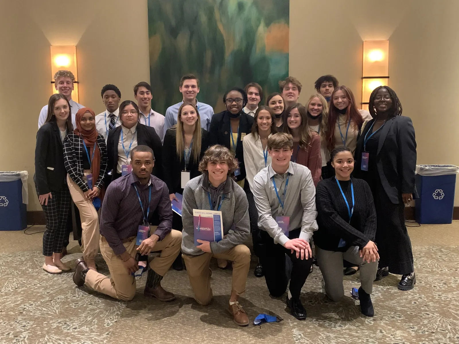 Brownsburg DECA members in business attire at a conference hotel